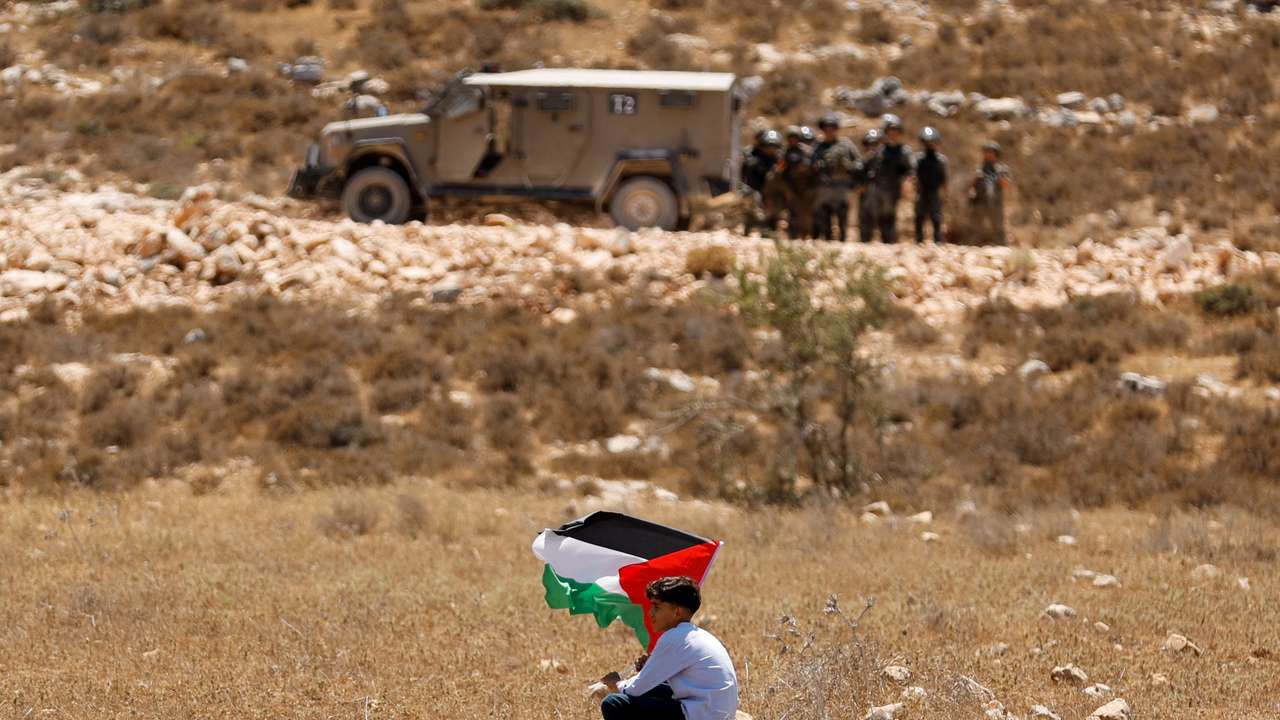 Palestinians demonstrate against what they say is Israel's confiscation of their land in Raba