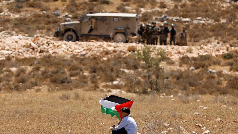 Palestinians demonstrate against what they say is Israel's confiscation of their land in Raba