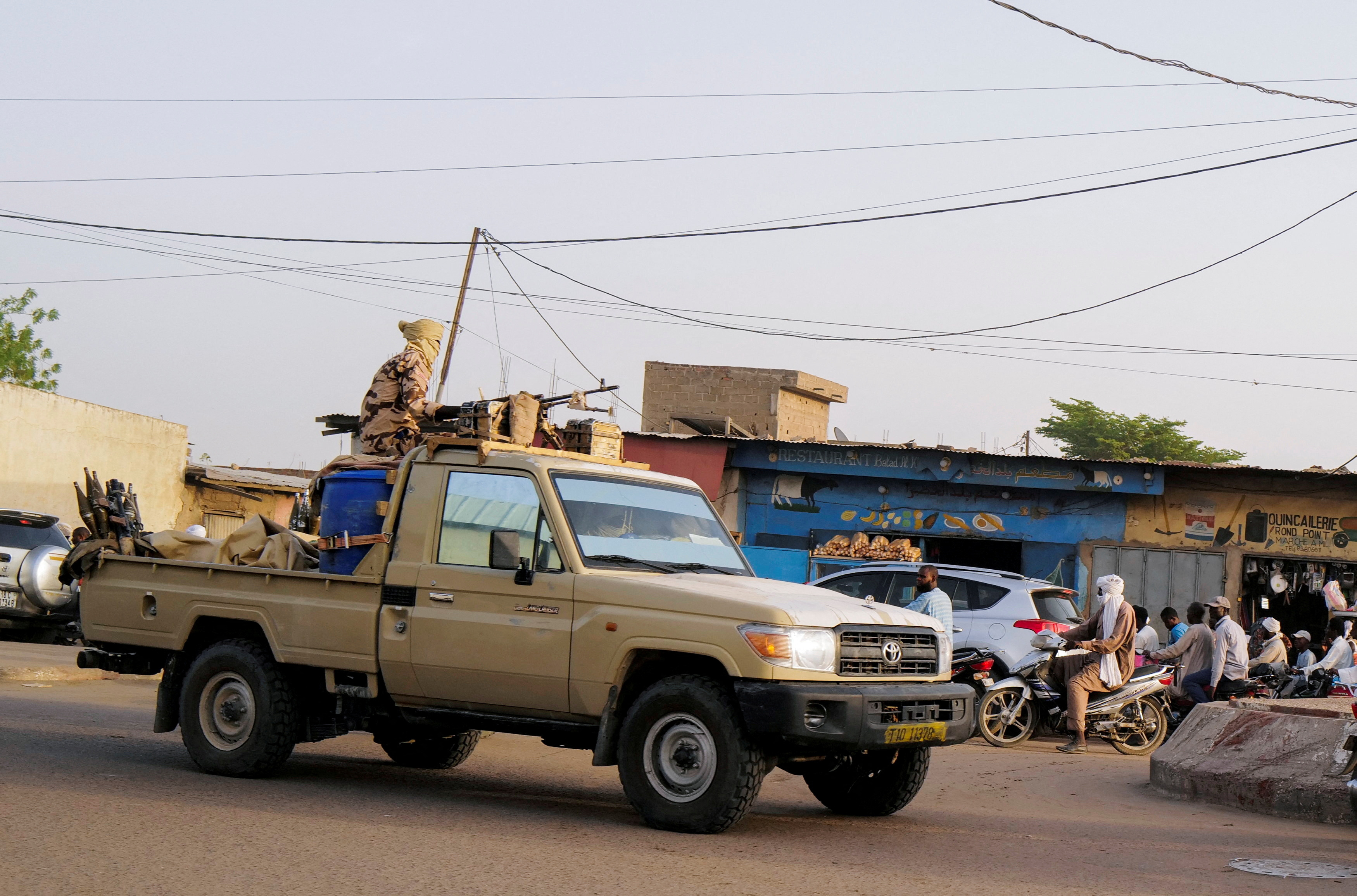 FILE PHOTO: Members of the security forces patrol Chad's capital N'Djamena following the battlefield death of President Idriss Deby in N'Djamena