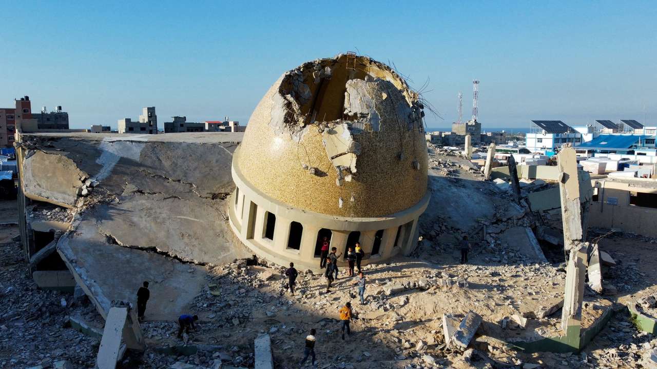 A mosque destroyed in Israeli strikes during the conflict lies in ruin, in Khan Younis