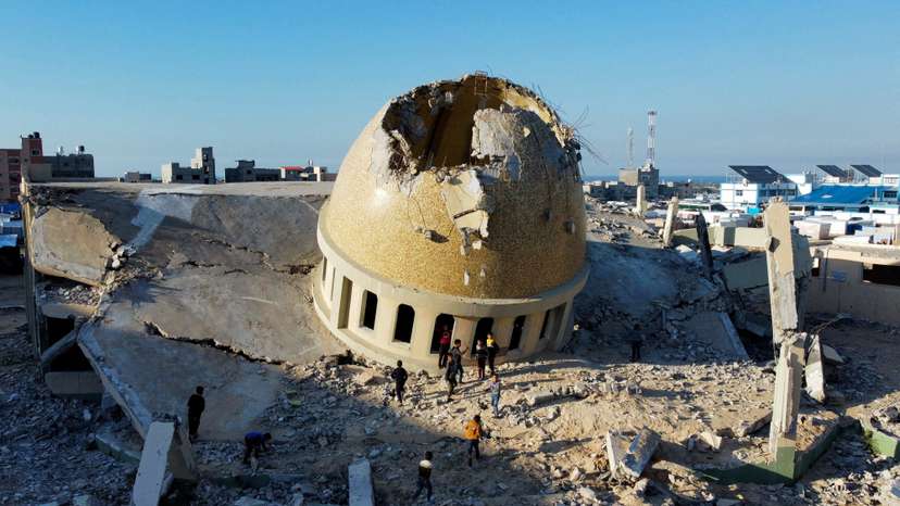 A mosque destroyed in Israeli strikes during the conflict lies in ruin, in Khan Younis