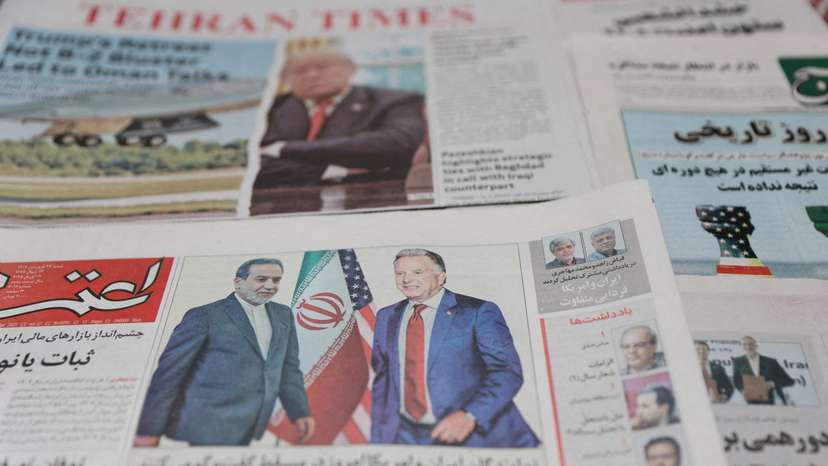 FILE PHOTO: An Iranian newspaper with a cover photo of Iran's Foreign Minister Abbas Araqchi and U.S. Middle East envoy Steve Witkoff, is seen in Tehran
