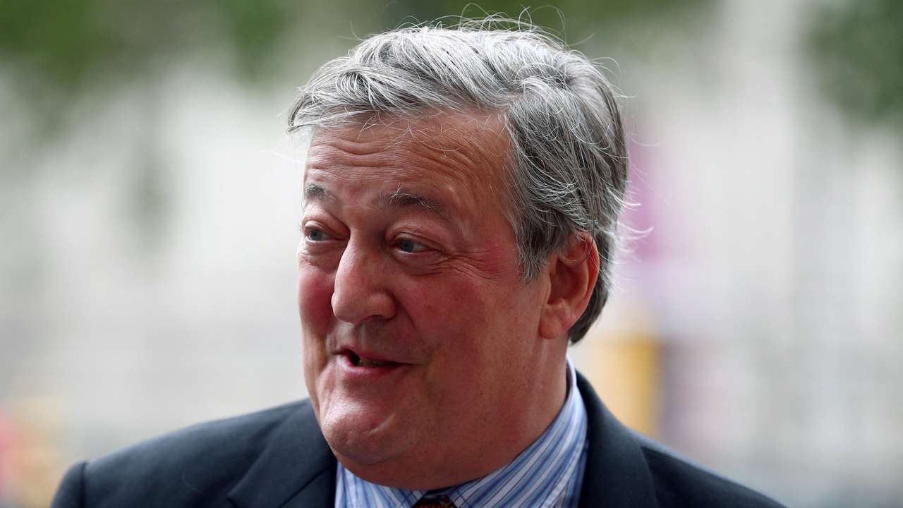 FILE PHOTO: Actor Stephen Fry attends a Service of Thanksgiving for Sir Peter Hall at Westminster Abbey in London