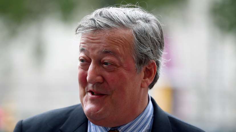 FILE PHOTO: Actor Stephen Fry attends a Service of Thanksgiving for Sir Peter Hall at Westminster Abbey in London