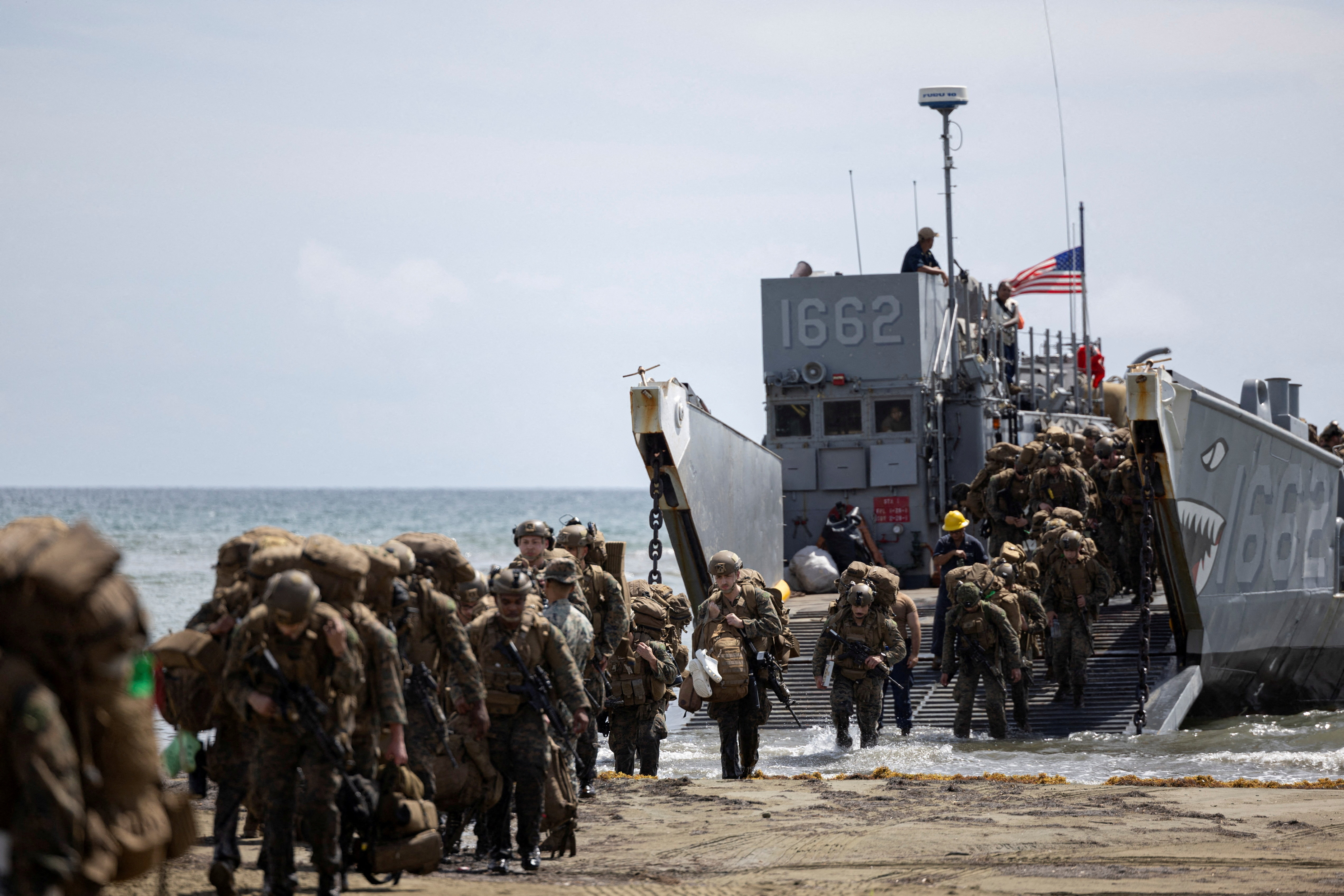 U.S. Marines come ashore from a landing craft utility (LCU) during training exercises in Arroyo