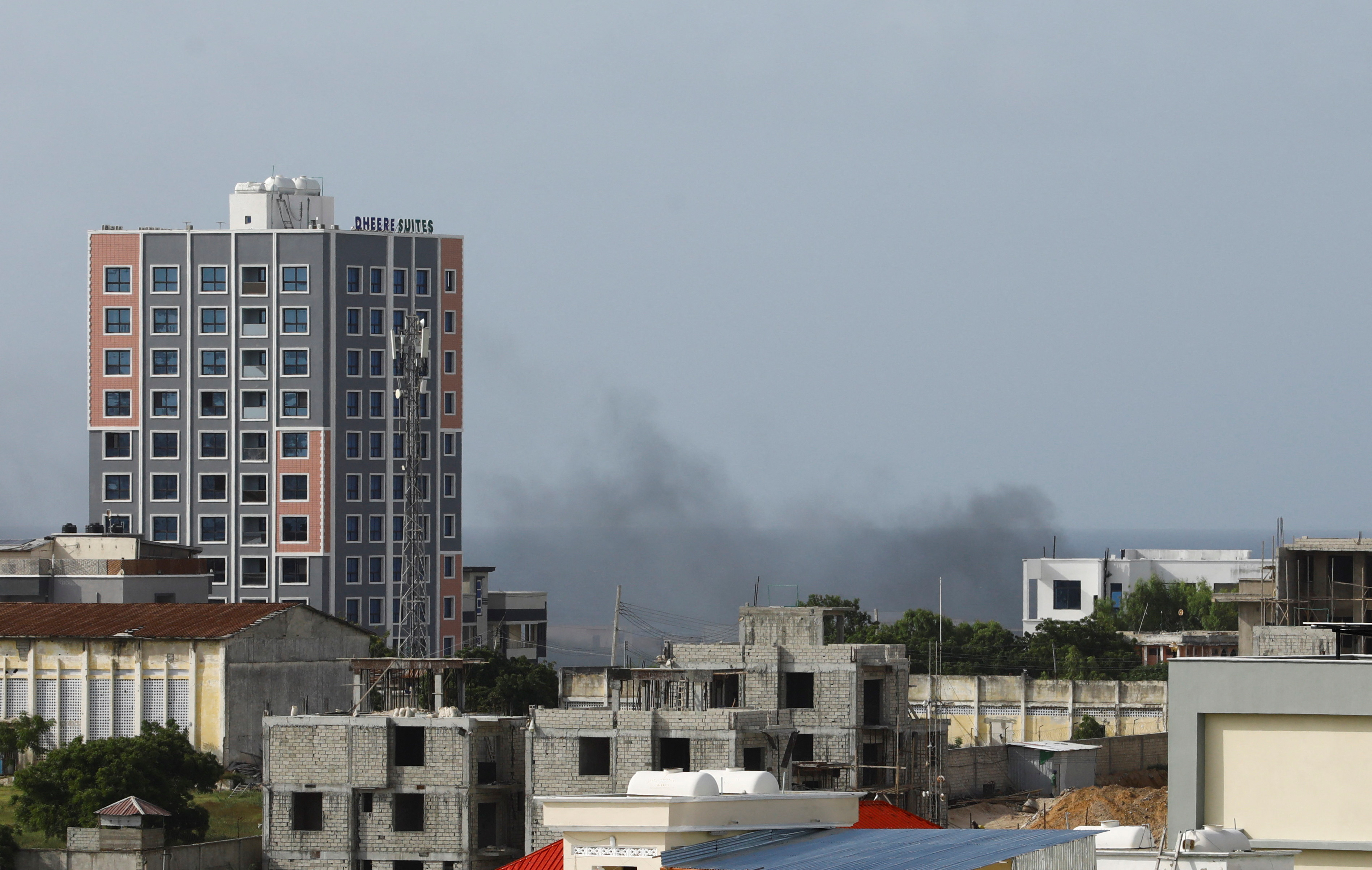 Smoke rises in the direction of Aden Adde airport following an African Union helicopter crash, in Mogadishu