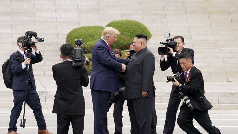 FILE PHOTO: U.S. President Donald Trump meets with North Korean leader Kim Jong Un