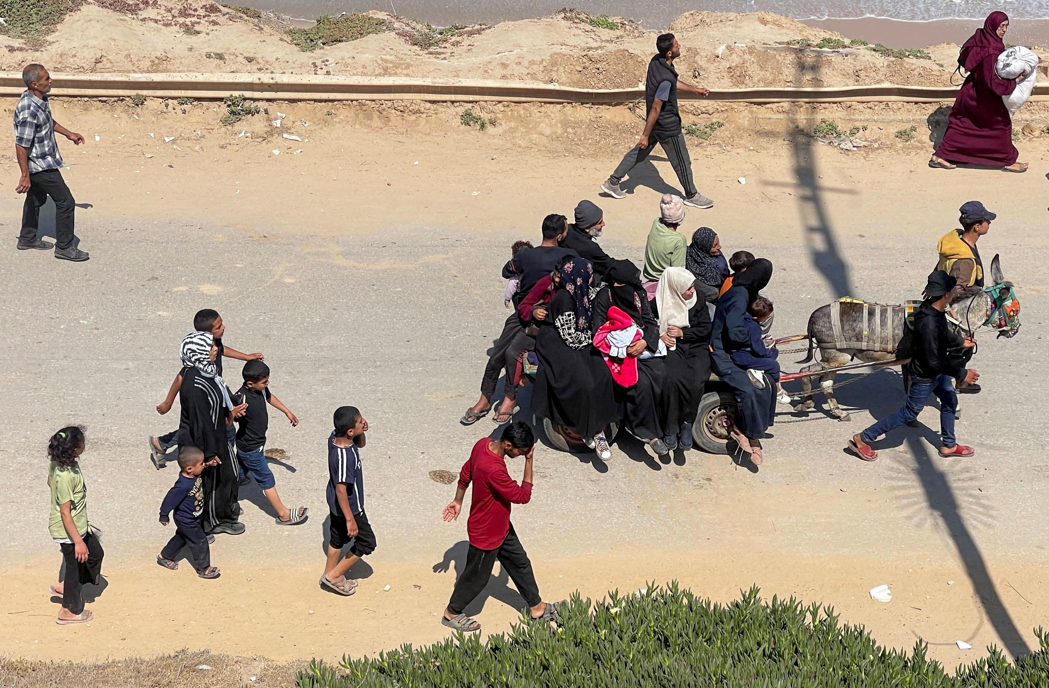 Palestinians, who were displaced by Israel's military offensive on south Gaza, attempt to return to their homes in north Gaza, as seen from central Gaza Strip