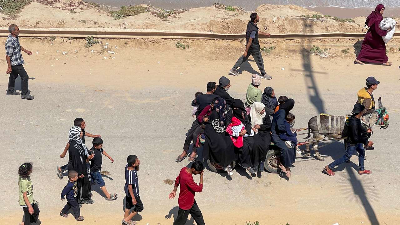 Palestinians, who were displaced by Israel's military offensive on south Gaza, attempt to return to their homes in north Gaza, as seen from central Gaza Strip