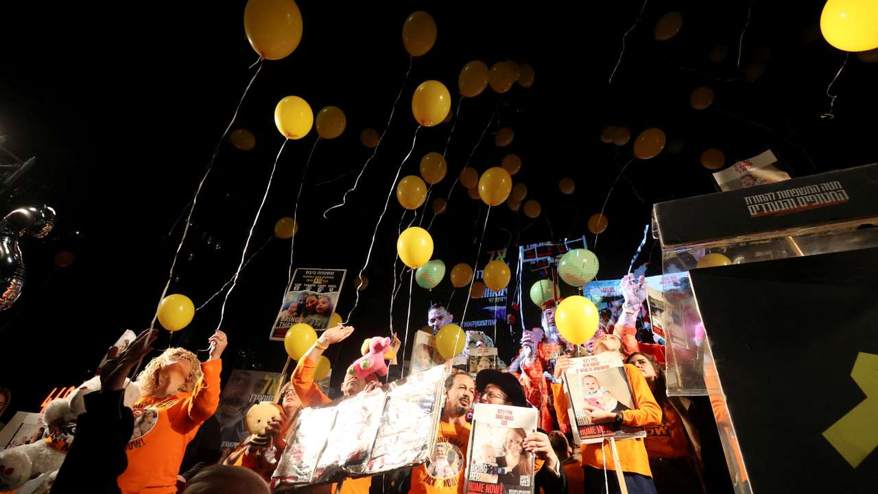 People gather to mark the second birthday of the youngest hostage in Gaza, Kfir Bibas, in Tel Aviv