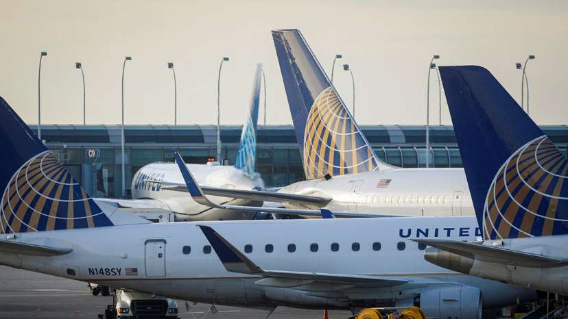 FILE PHOTO: United Airlines planes are parked at their gates at O'Hare International Airport ahead of the Thanksgiving holiday in Chicago, Illinois
