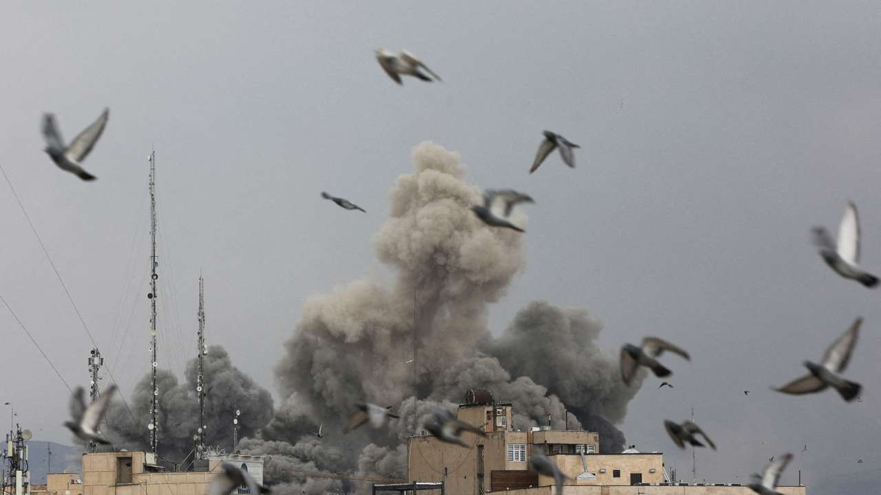 Smoke rises following an explosion, after Israel and the U.S. launched strikes on Iran, in Tehran