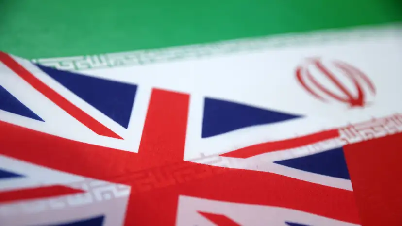 Illustration shows UK and Iran flags