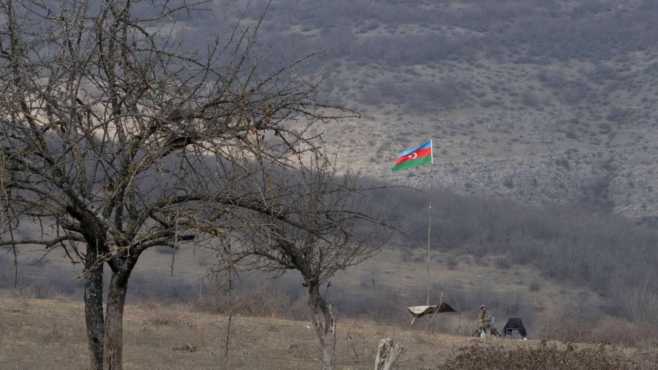 An Azeri soldier is seen at fighting positions near divided Taghavard village in Nagorno-Karabakh region