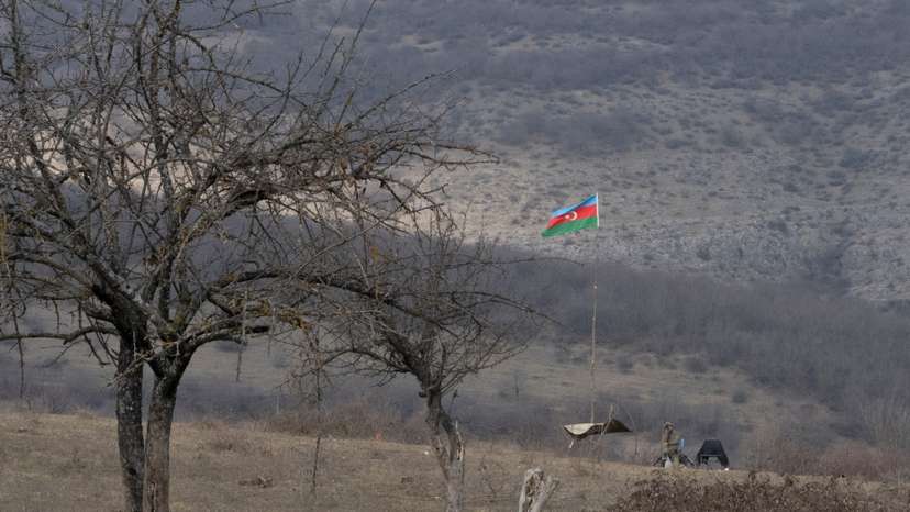 An Azeri soldier is seen at fighting positions near divided Taghavard village in Nagorno-Karabakh region