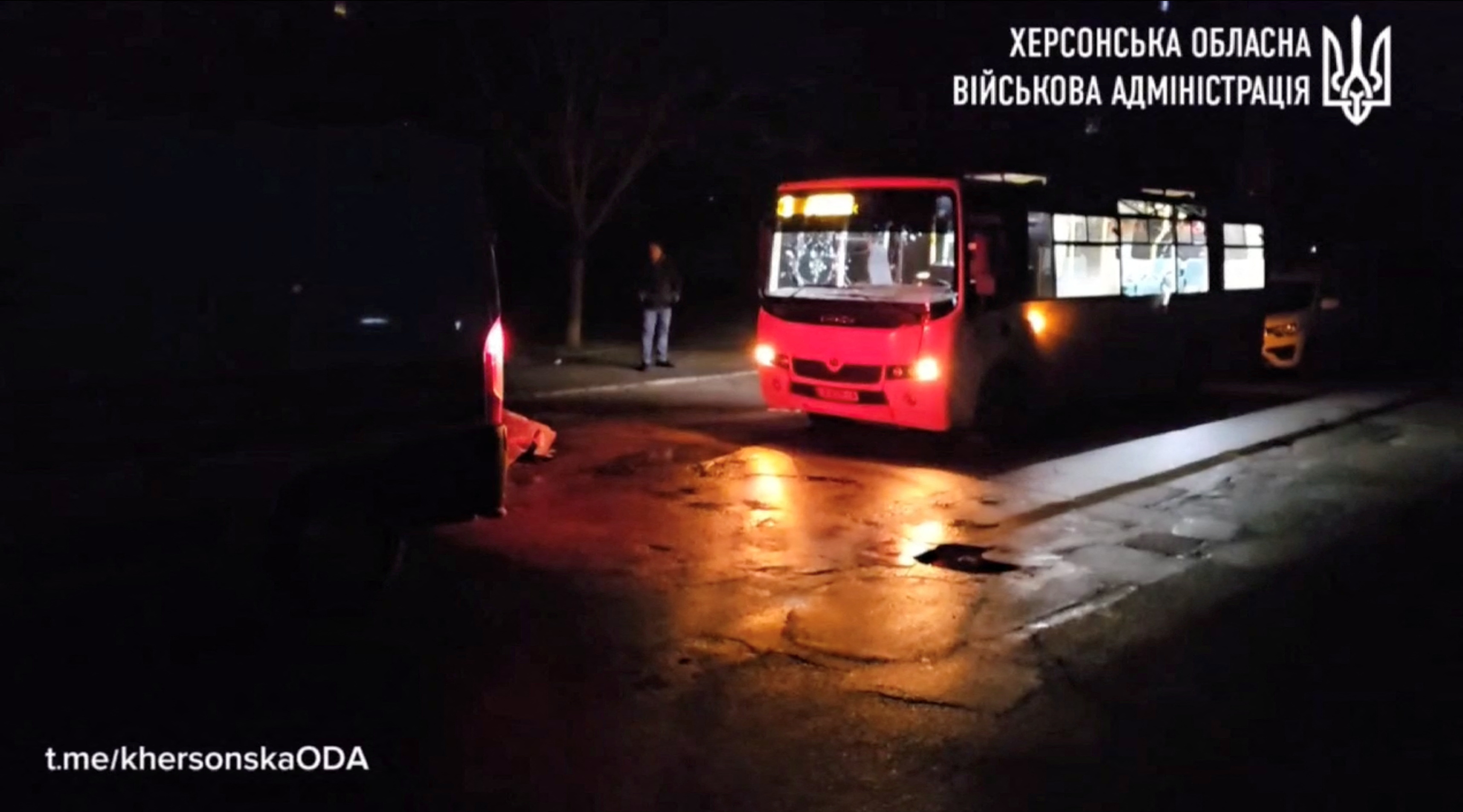 A civilian passenger bus stands after a Russian drone attack in Ukraine