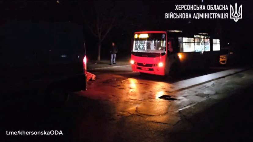 A civilian passenger bus stands after a Russian drone attack in Ukraine