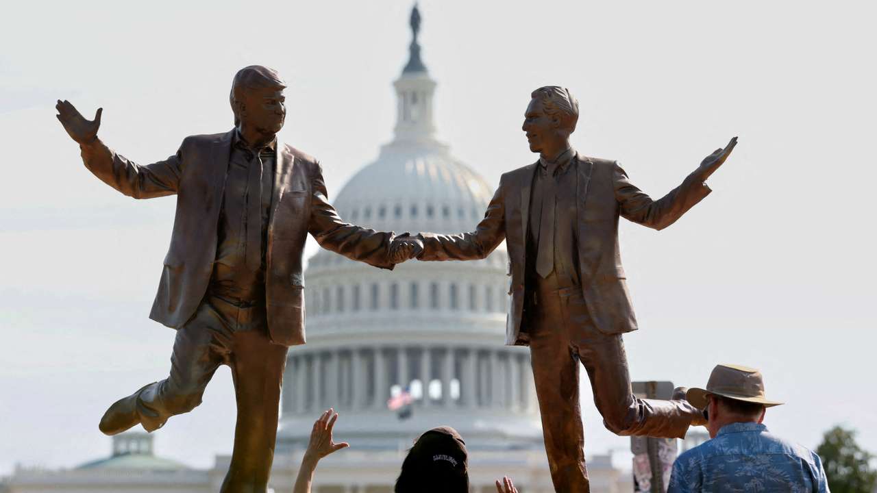 FILE PHOTO: Pop-up statue of Trump and Epstein in Washington
