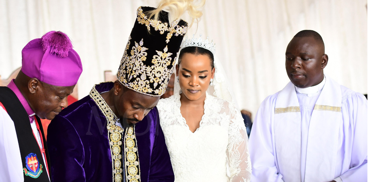King and Queen sign at the wedding - Uganda royal wedding
