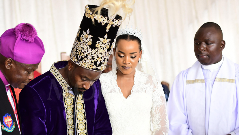 King and Queen sign at the wedding - Uganda royal wedding