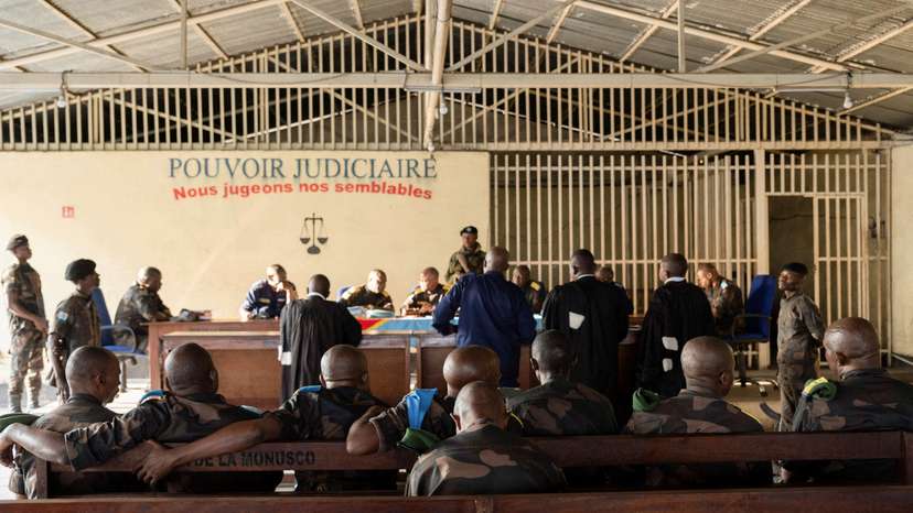 FILE PHOTO: Members of the Congolese Army accused of desertion and cowardice when fighting M23 rebels are sentenced at the military courtroom in Goma