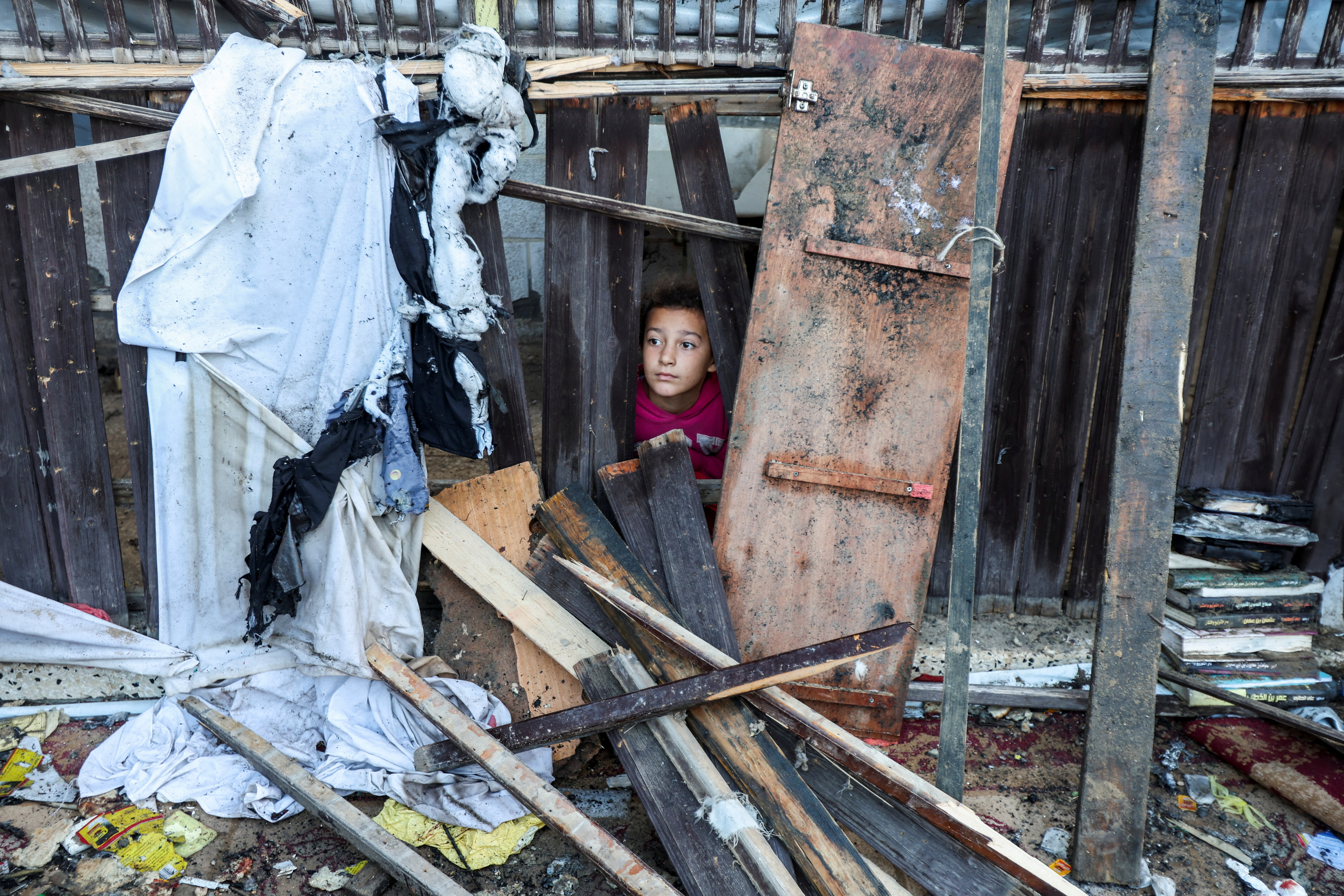 Aftermath of an Israeli strike on tents of displaced people, in Deir Al-Balah