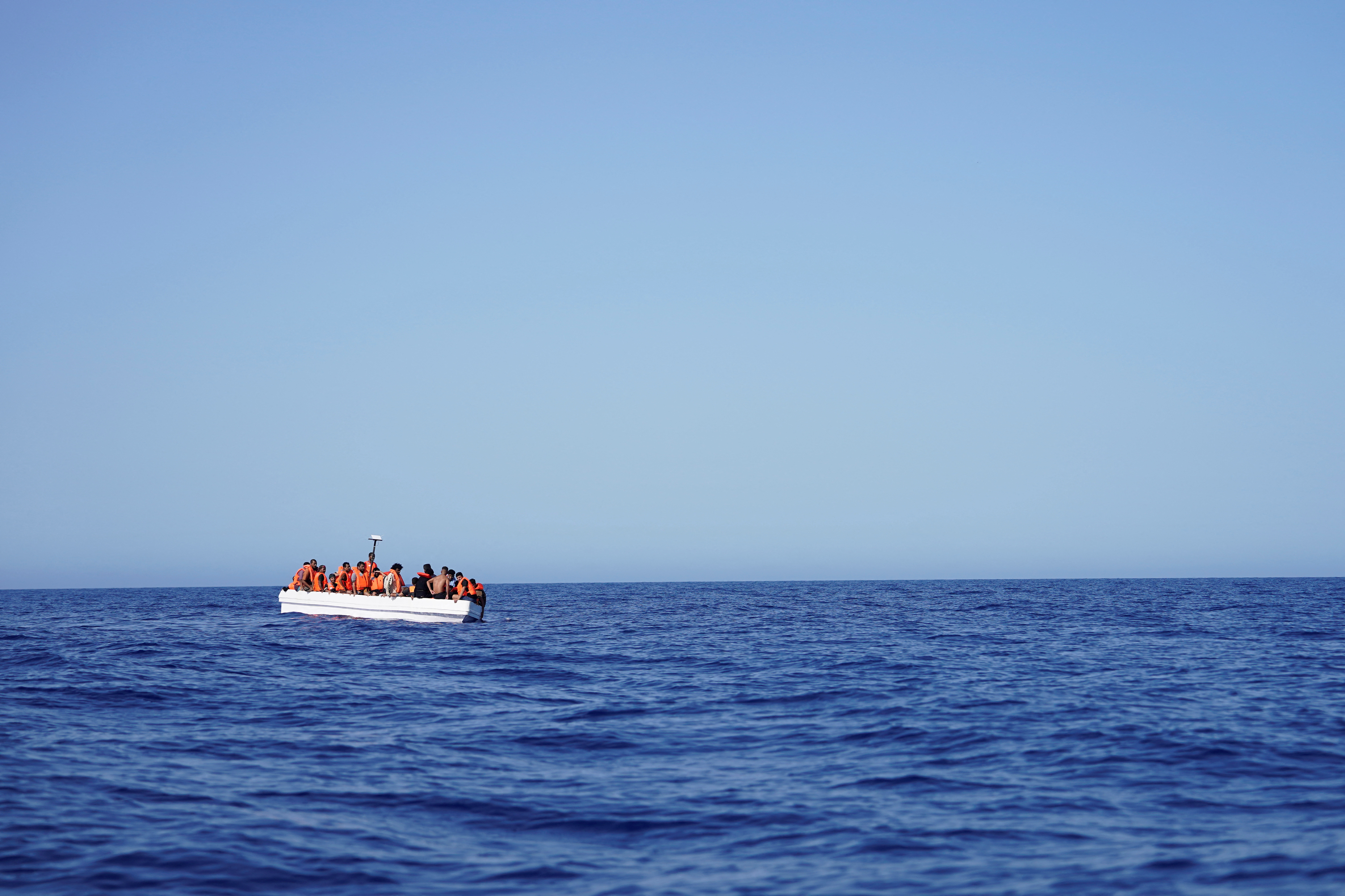 NGO Open Arms rescue boat "Astral" assists migrants in international waters
