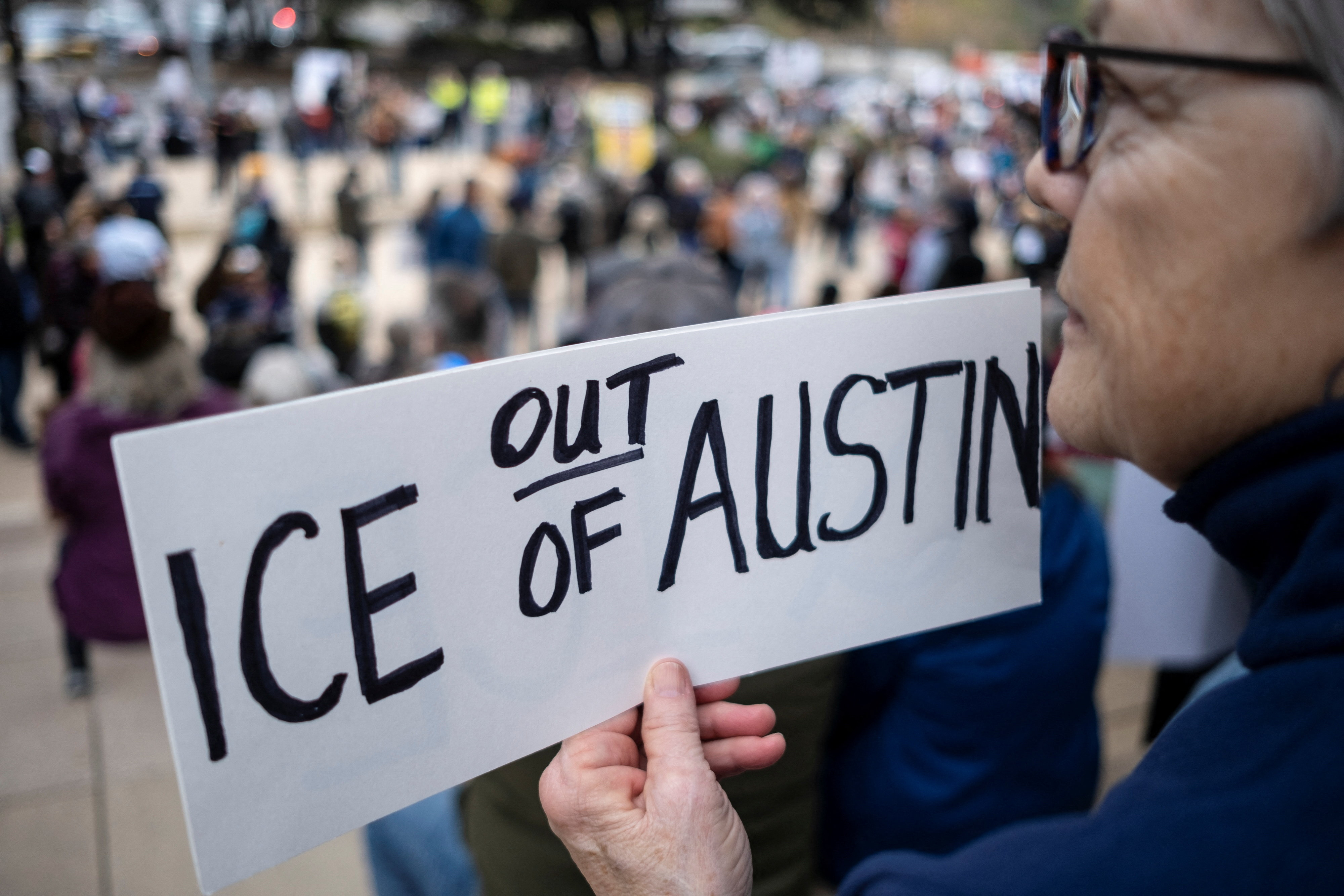 People protest against cooperation with ICE in Austin