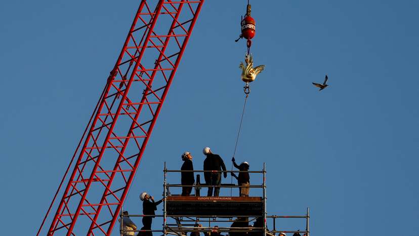 A new rooster is prepared to be installed at the top of the spire of the Notre-Dame de Paris Cathedral