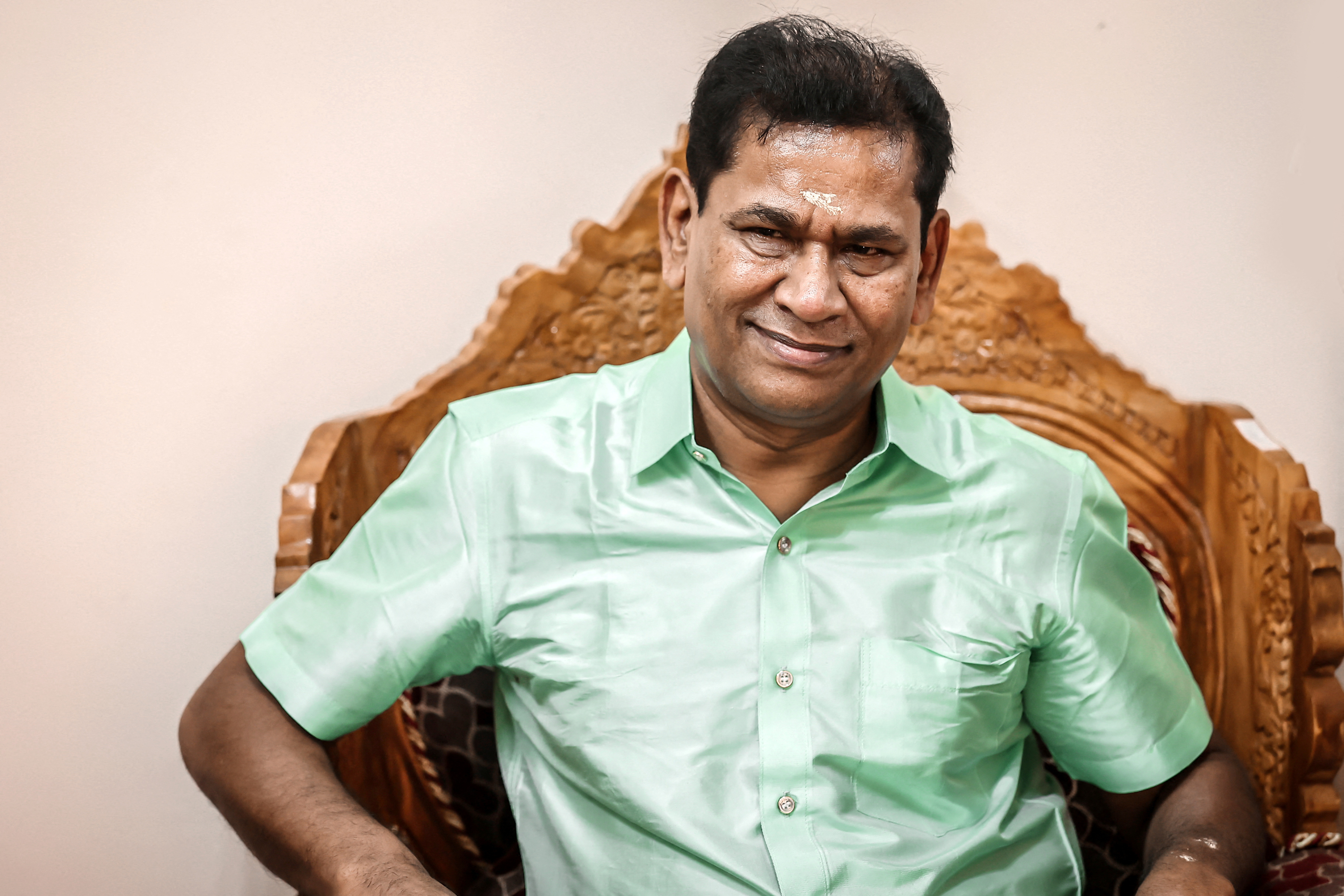FILE PHOTO: Santiago Martin poses for a photograph at an event in Coimbatore