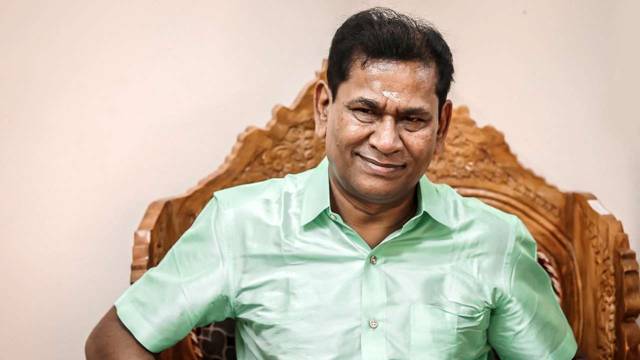 FILE PHOTO: Santiago Martin poses for a photograph at an event in Coimbatore