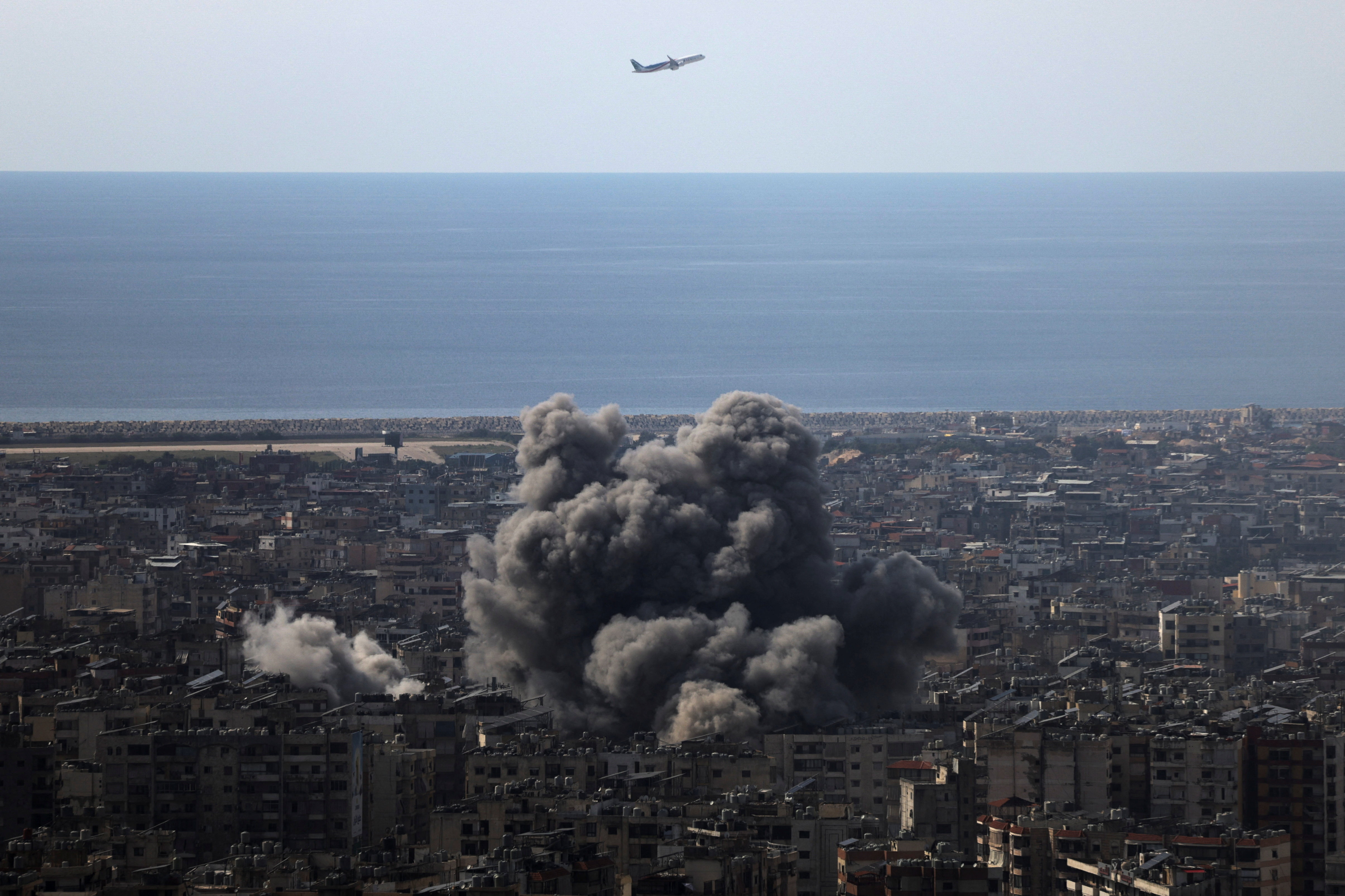 Smoke rises after an Israeli strike on Beirut's southern suburbs