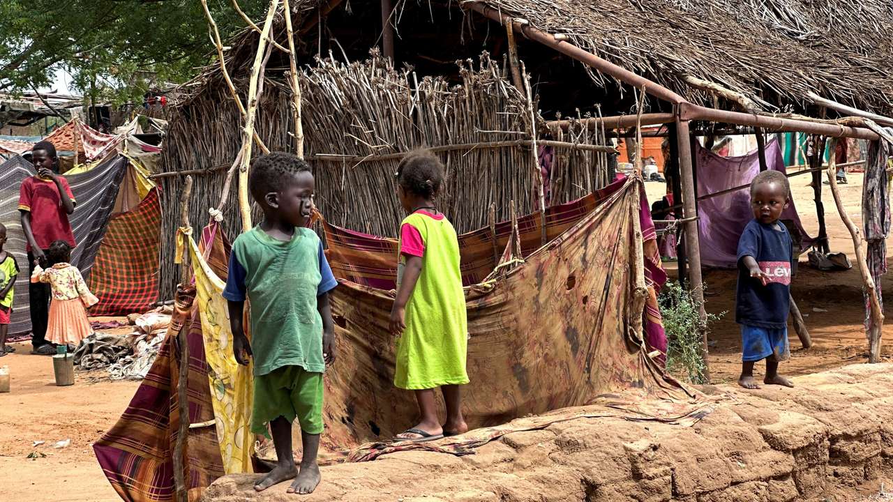 FILE PHOTO: Displaced Sudanese children stand at Zamzam camp in North Darfur