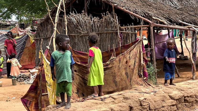 FILE PHOTO: Displaced Sudanese children stand at Zamzam camp in North Darfur