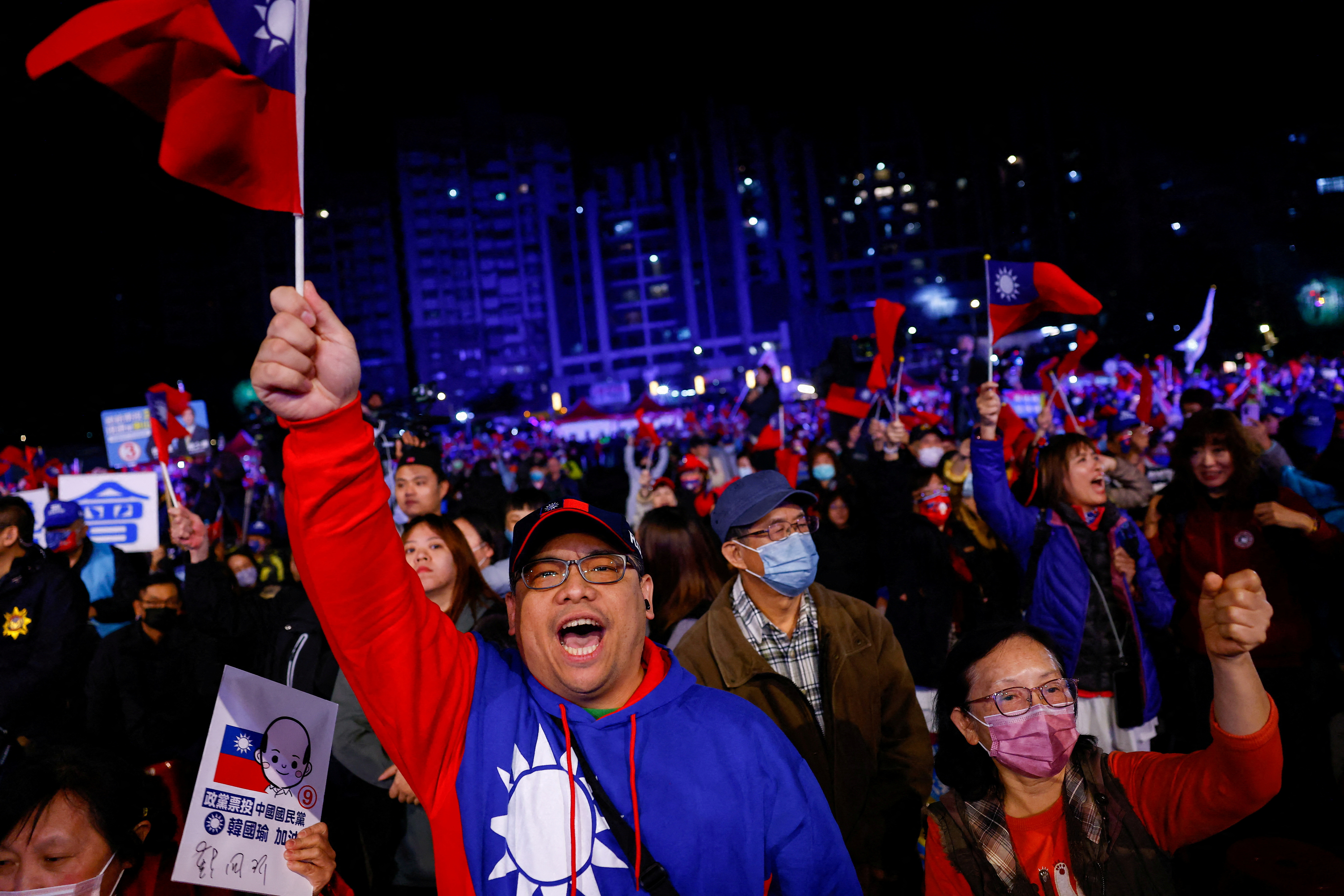 Supporters of Hou Yu-ih, a candidate for Taiwan's presidency from the main opposition party Kuomintang (KMT), attend a campaign event in Keelung