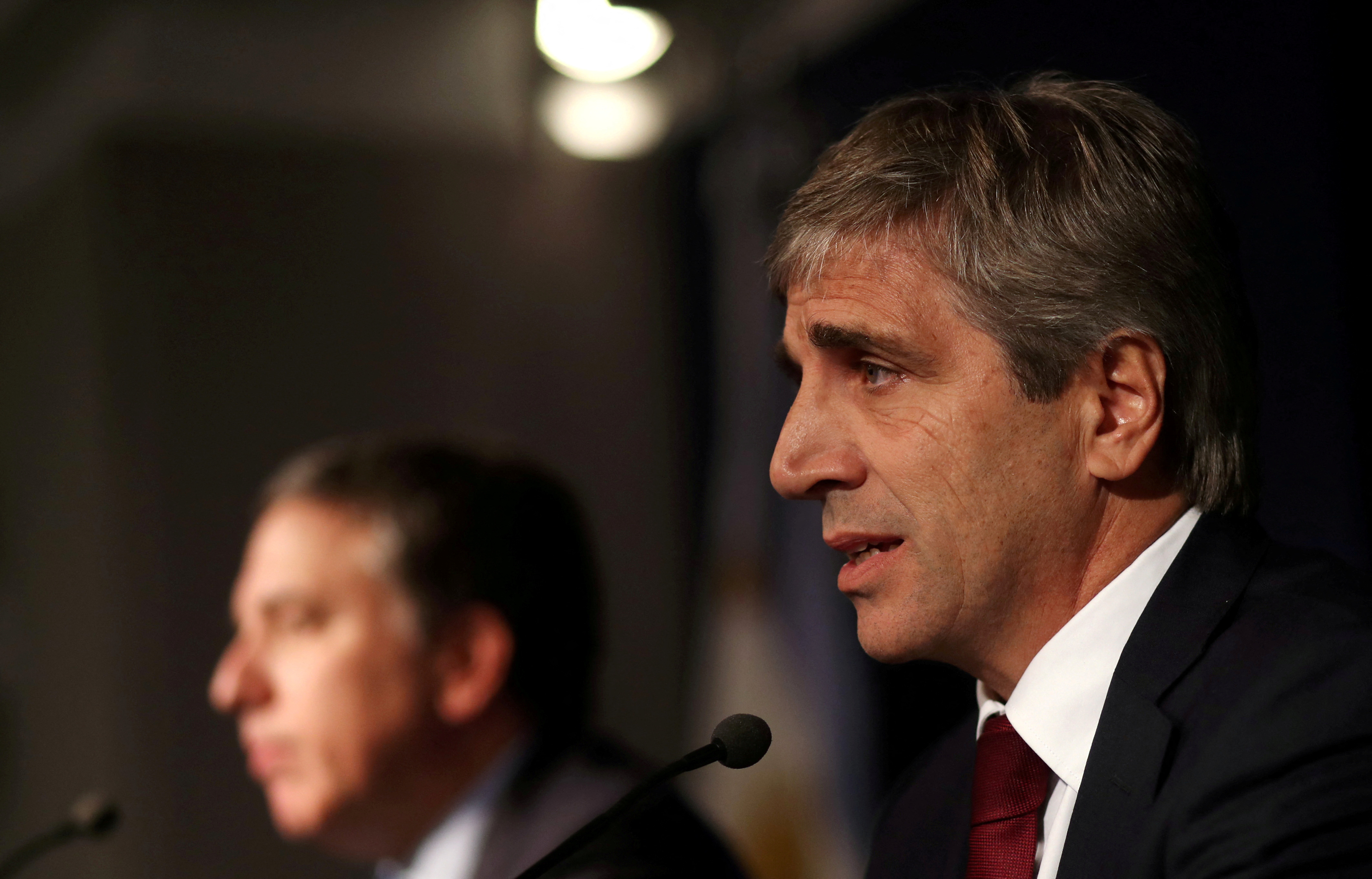 FILE PHOTO: Former governor of Argentina's central bank, Caputo, speaks during a news conference in Buenos Aires