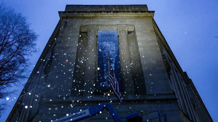 New banner depicting U.S. President Donald Trump is put up on the Department of Justice building in Washington, D.C.