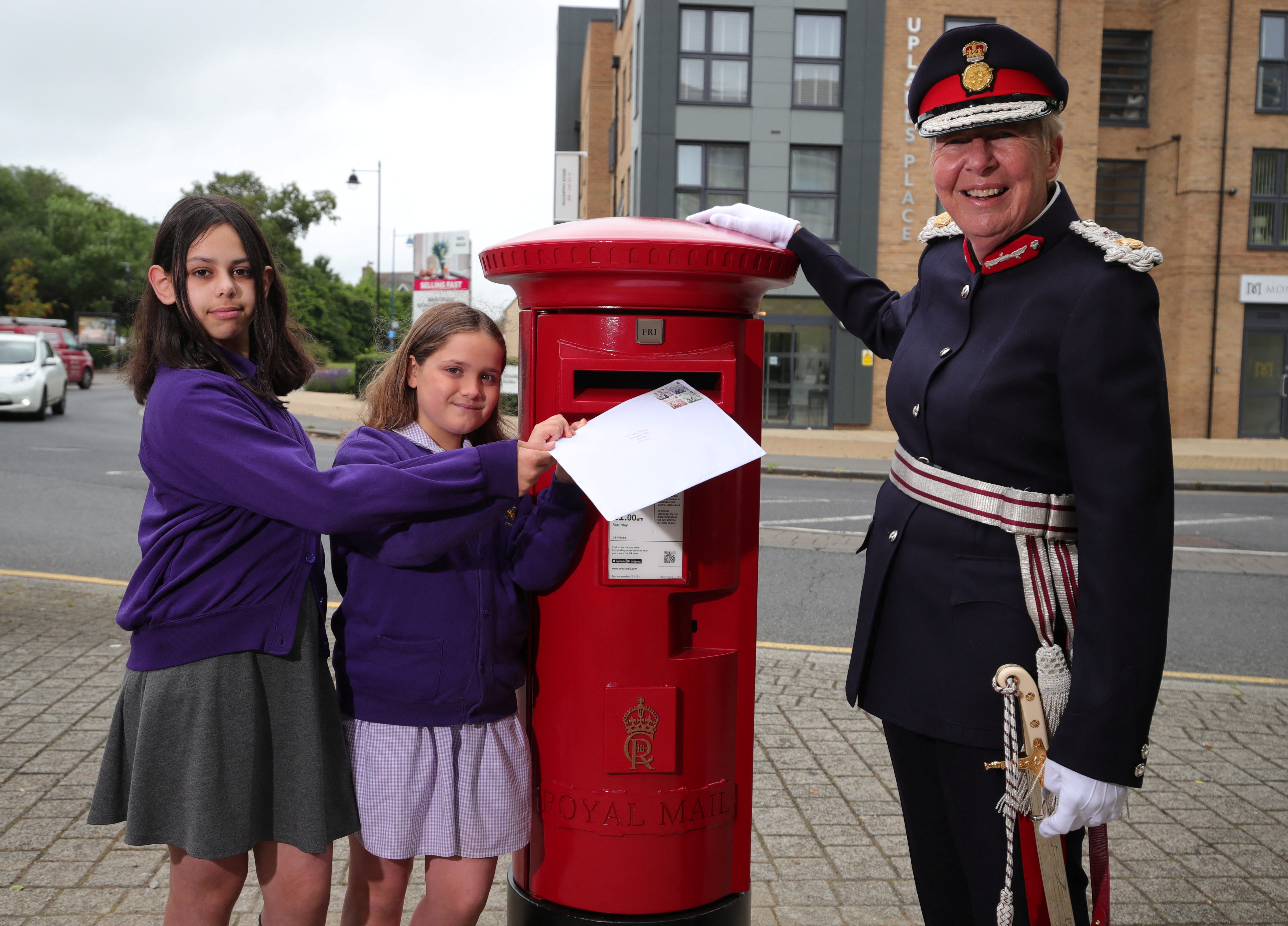 First postbox bearing the cypher of Britain's King Charles is installed in Great Cambourne
