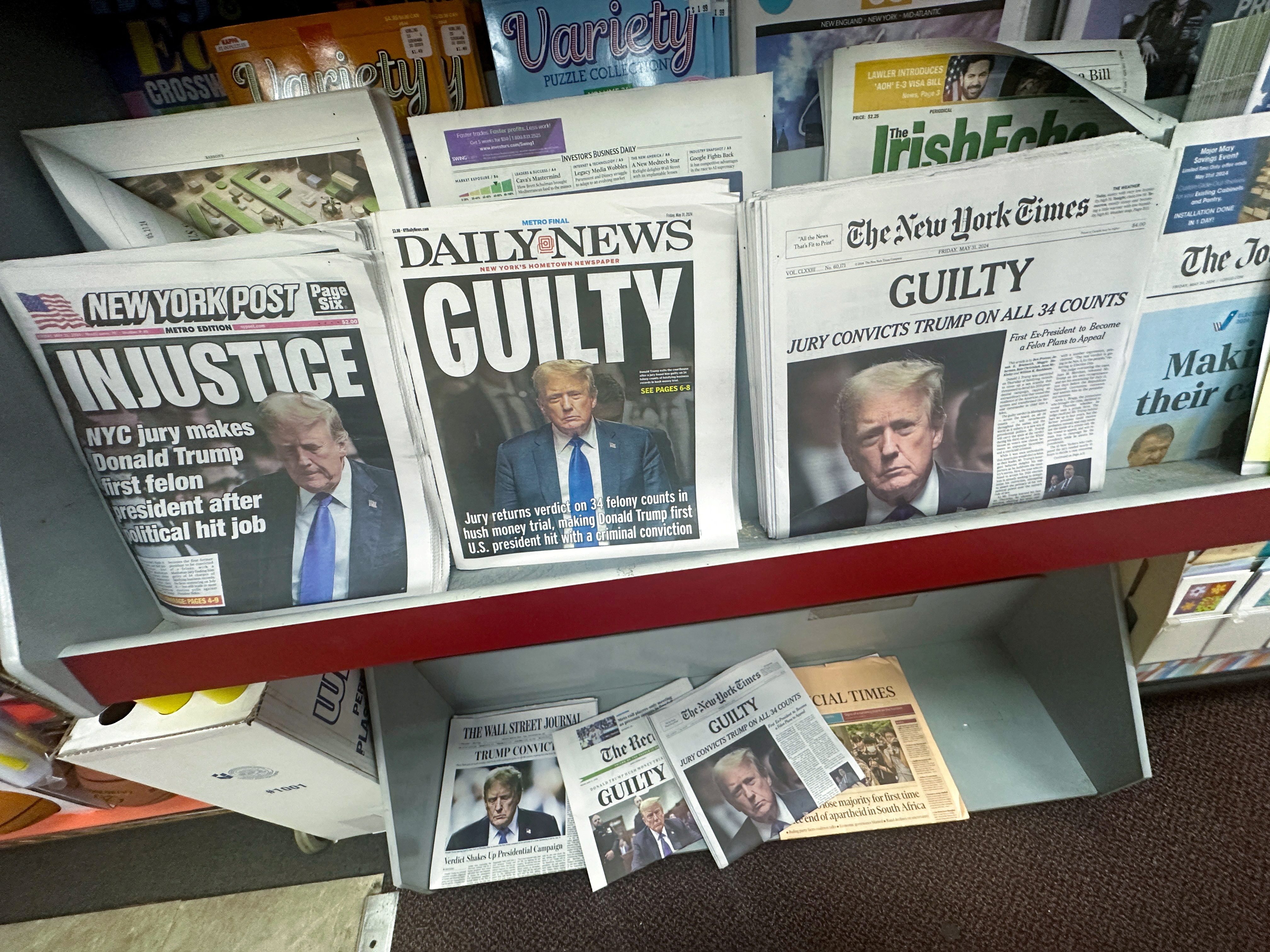 FILE PHOTO: Newspaper headlines following Trump verdict