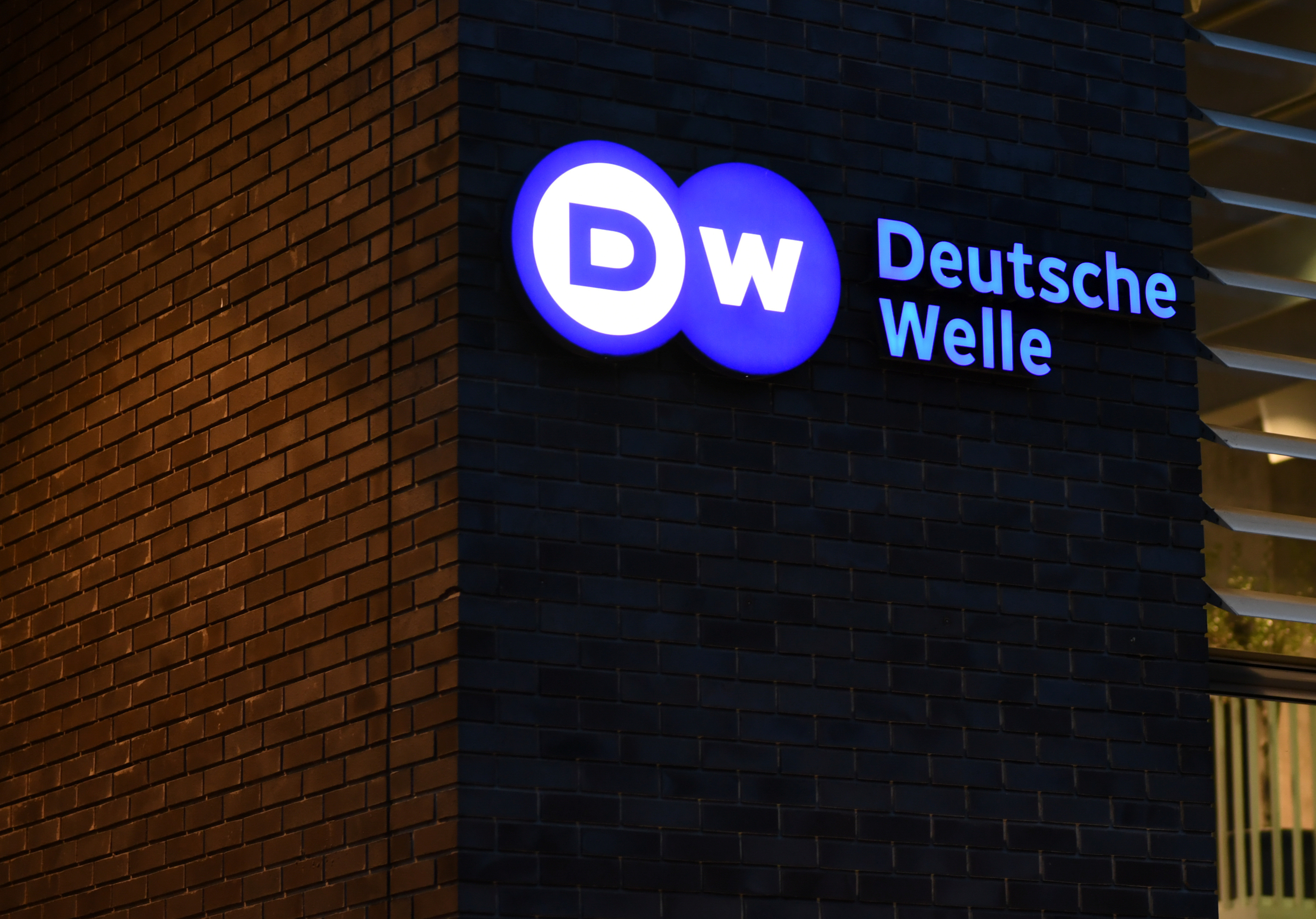 The logo of German international broadcaster Deutsche Welle is pictured in Berlin