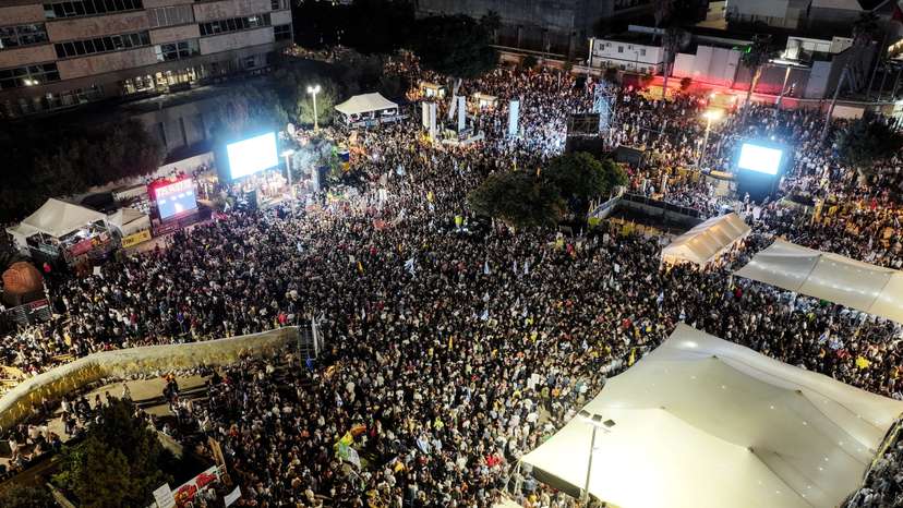 A drone photo of people gathering in "Hostages square", after a ceasefire between Israel and Hamas in Gaza went into effect, in Tel Aviv