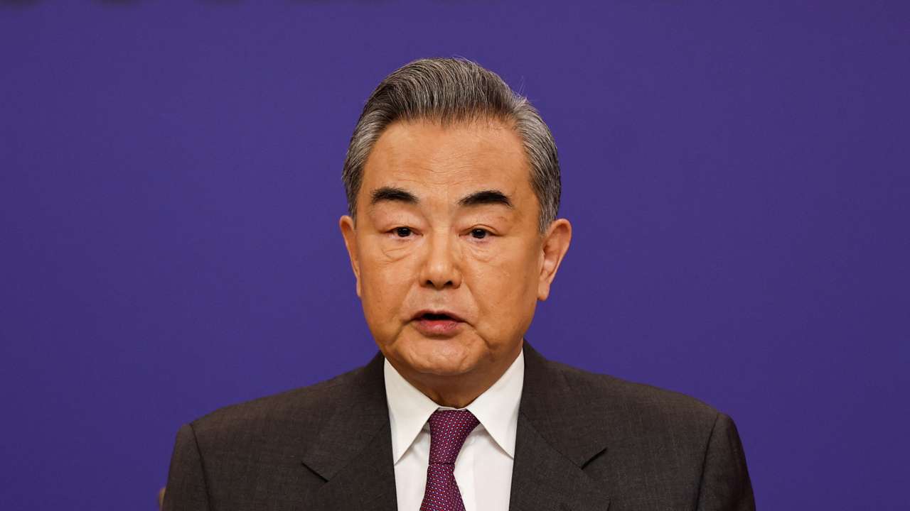 Chinese Foreign Minister Wang Yi attends a press conference on the sidelines of the NPC, in Beijing