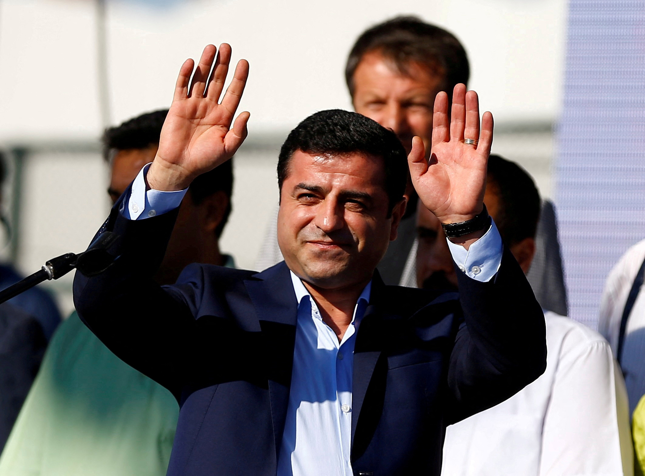 FILE PHOTO: HDP co-leader Demirtas greeting the crowd during a peace rally to protest against Turkish military operations in northern Syria, in Istanbul