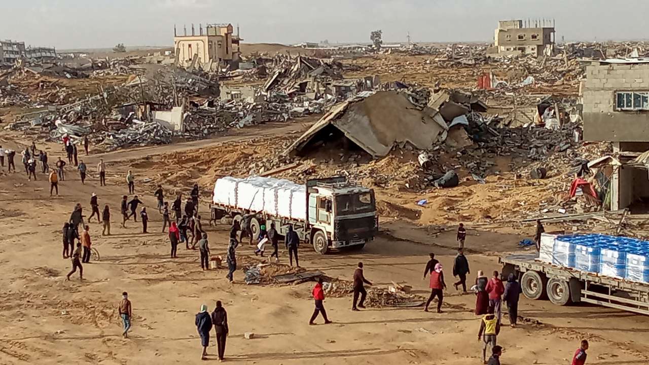Aid trucks cross into the Gaza Strip