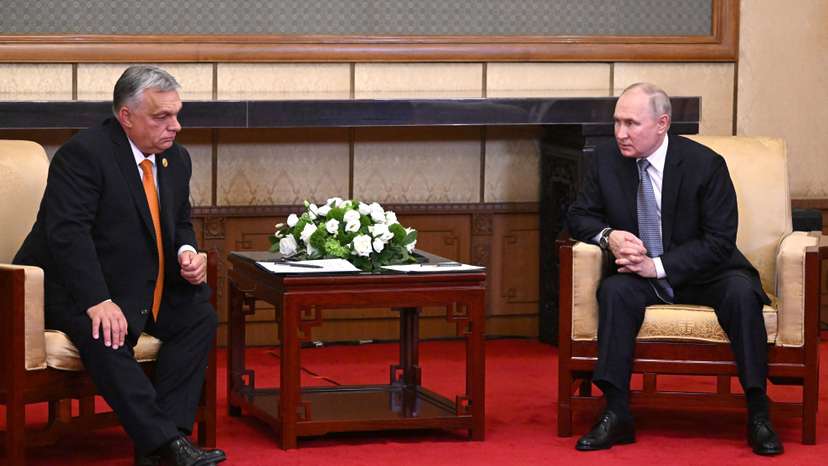 Russian President Putin and Hungarian Prime Minister Orban meet in Beijing