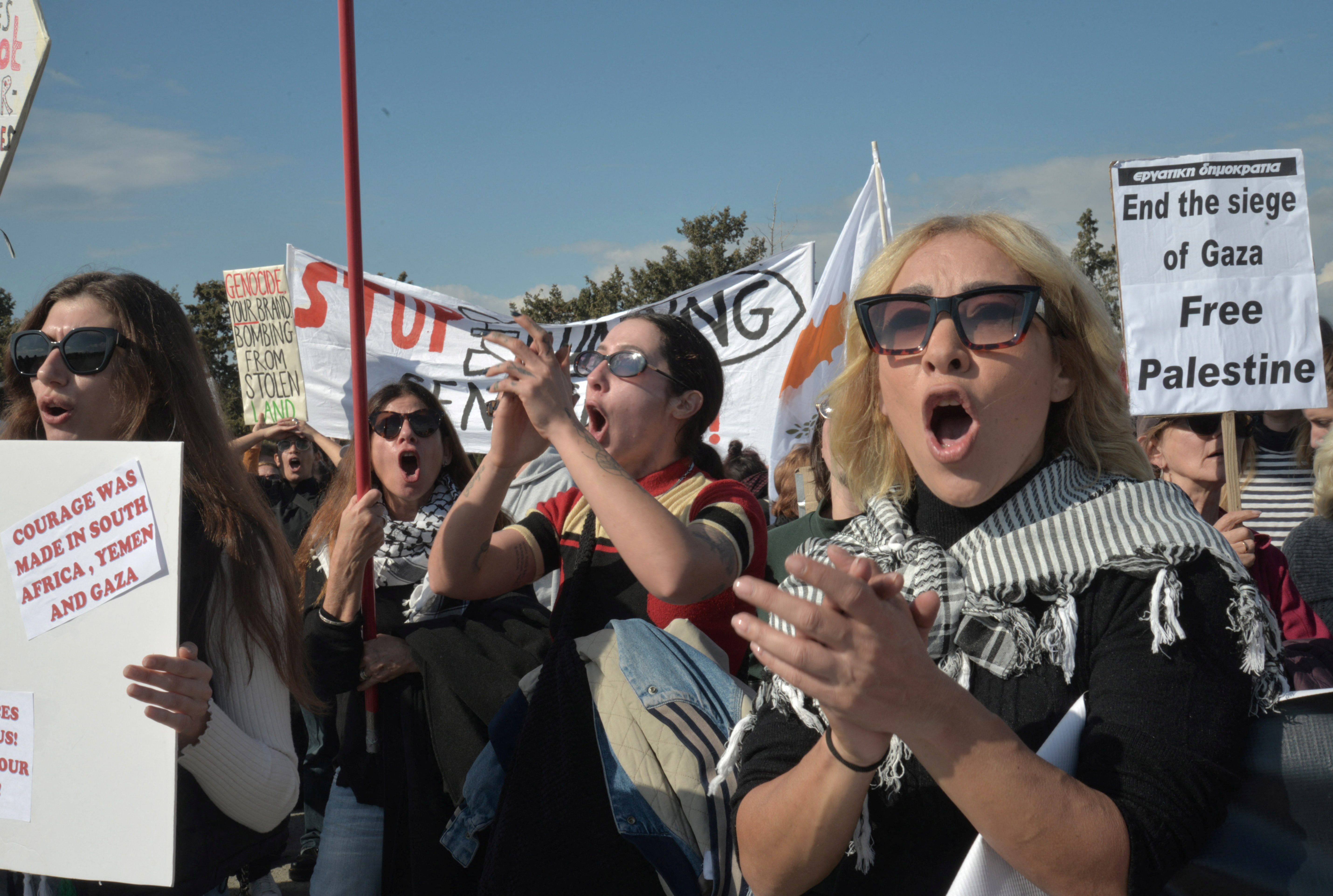 Protest at gates of RAF Akrotiri, British base on Cyprus used to launch strikes against Houthi militia in Yemen, near Limassol