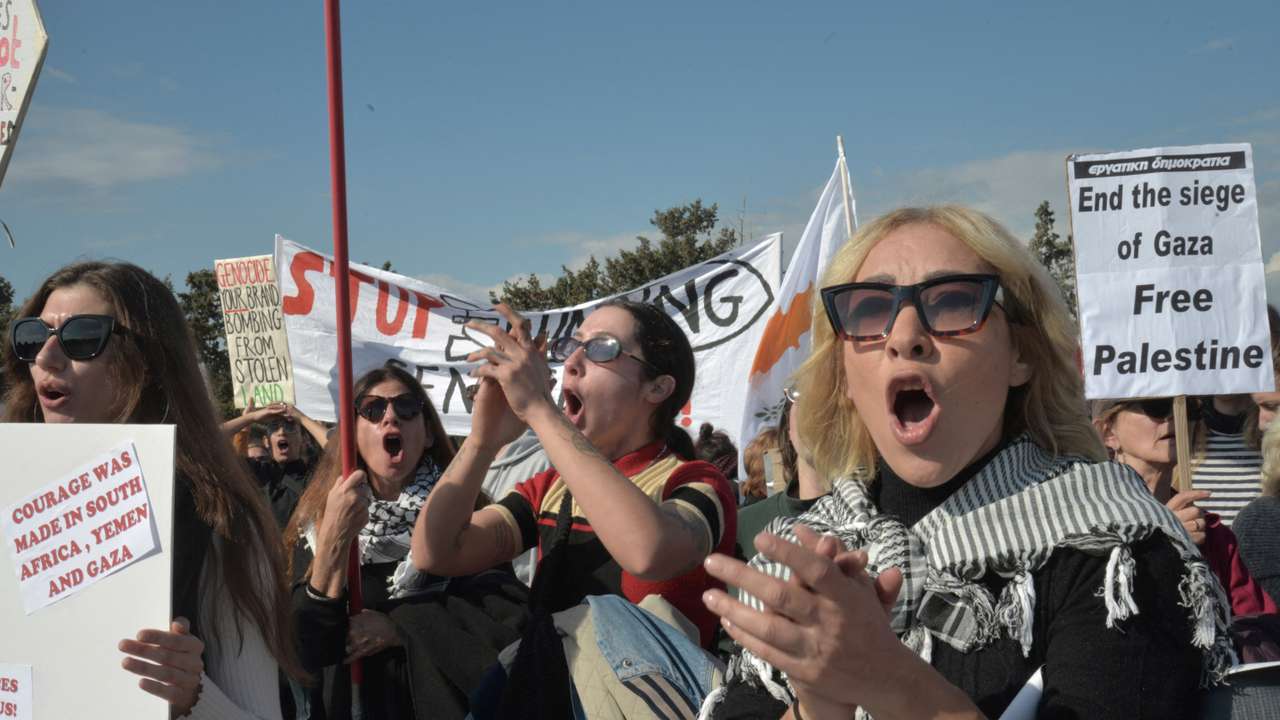 Protest at gates of RAF Akrotiri, British base on Cyprus used to launch strikes against Houthi militia in Yemen, near Limassol