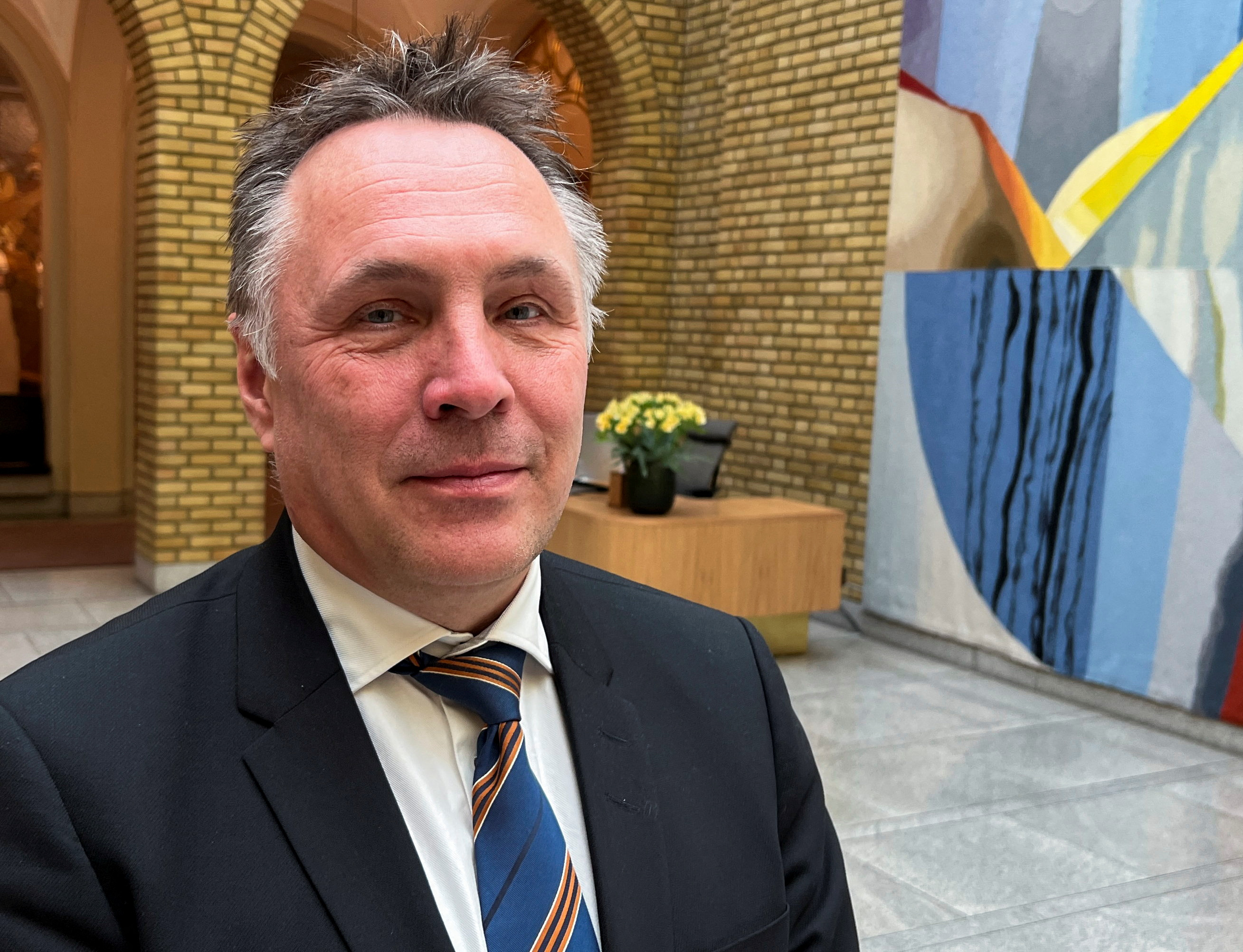 Norwegian Defence Minister Tore O. Sandvik poses for a picture at the Norwegian Parliament in Oslo