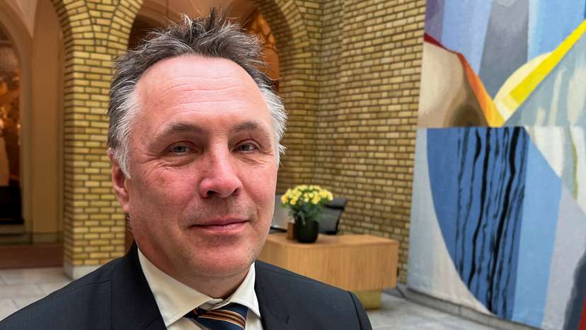 Norwegian Defence Minister Tore O. Sandvik poses for a picture at the Norwegian Parliament in Oslo