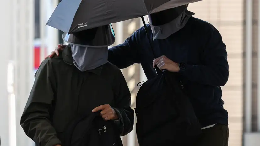 Kwok Yin-sang, father of wanted U.S.-based activist Anna Kwok, arrives at the West Kowloon Magistrates’ Courts building in Hong Kong